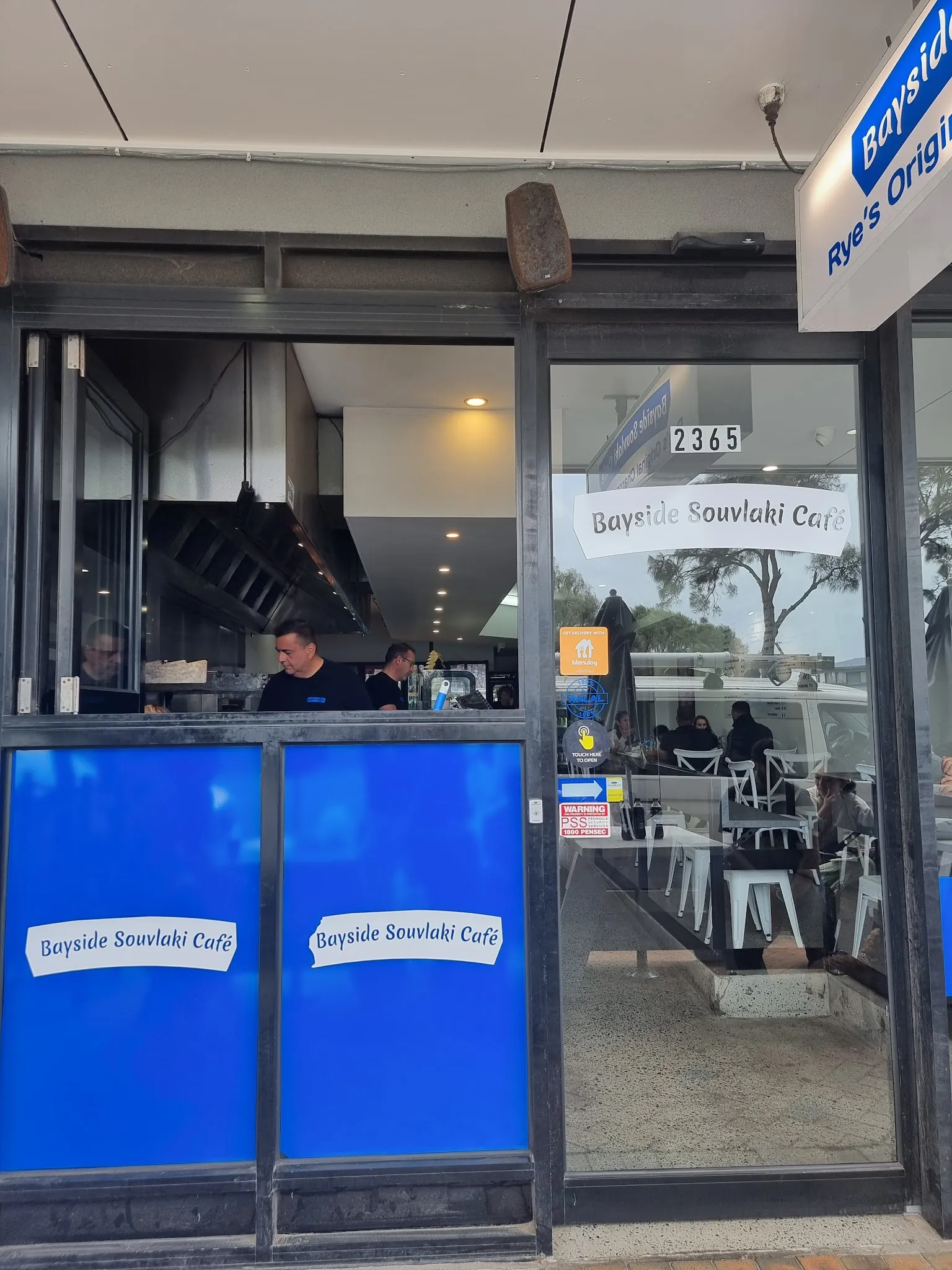 Interior of Bayside Souvlaki Cafe showing the counter and ordering area