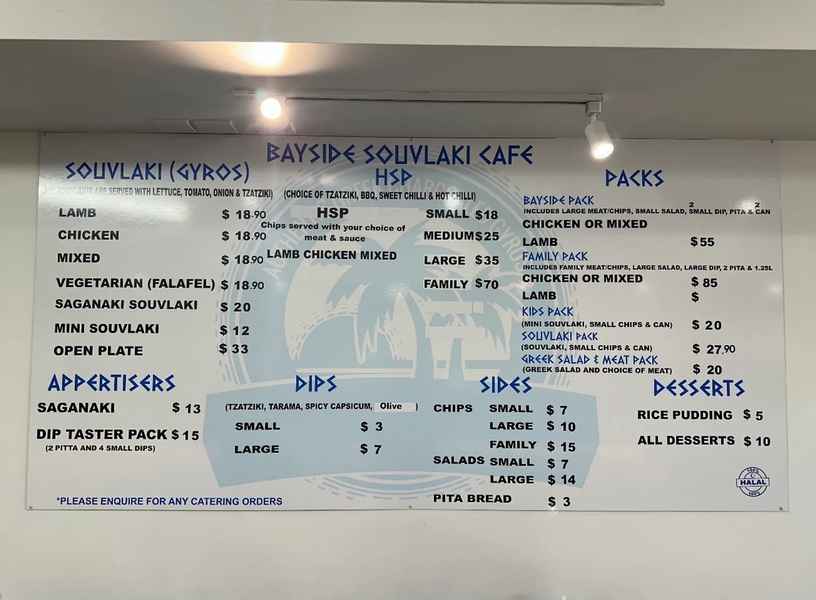 Bayside Souvlaki Cafe full menu board showing souvlaki, HSP, packs, dips and dessert prices